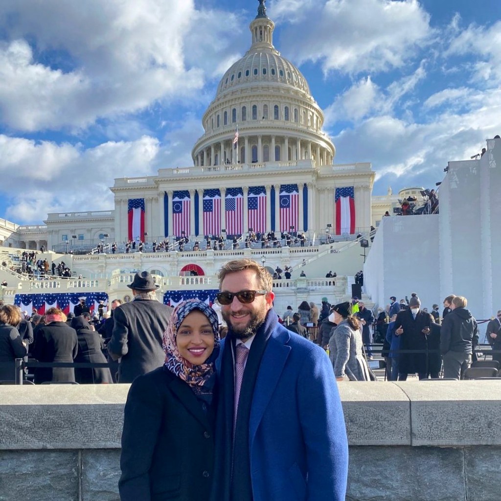 Ilhan Omar and her husband, Tim Mynett, posing at the Capitol.