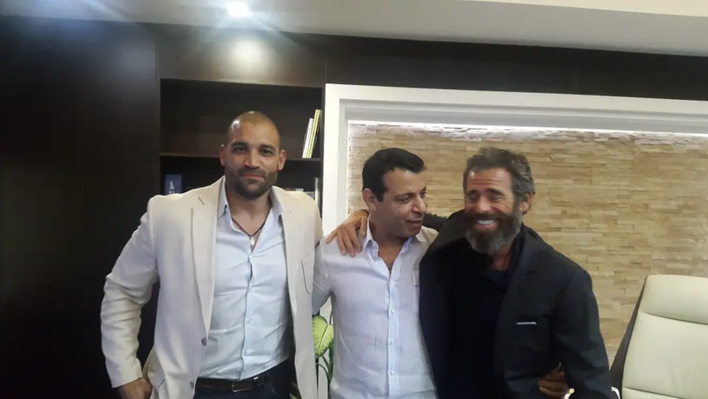 Isaac Gilmore, Mohammed Dahlan, and Abraham Golan standing side by side.
