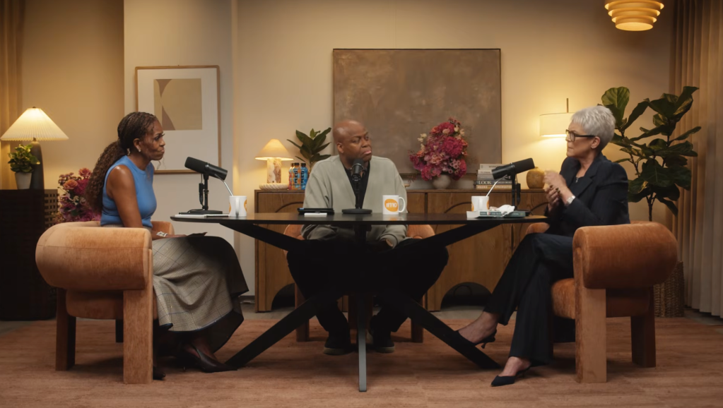 Jamie Lee Curtis and Michelle Obama speak on a podcast with a male host.