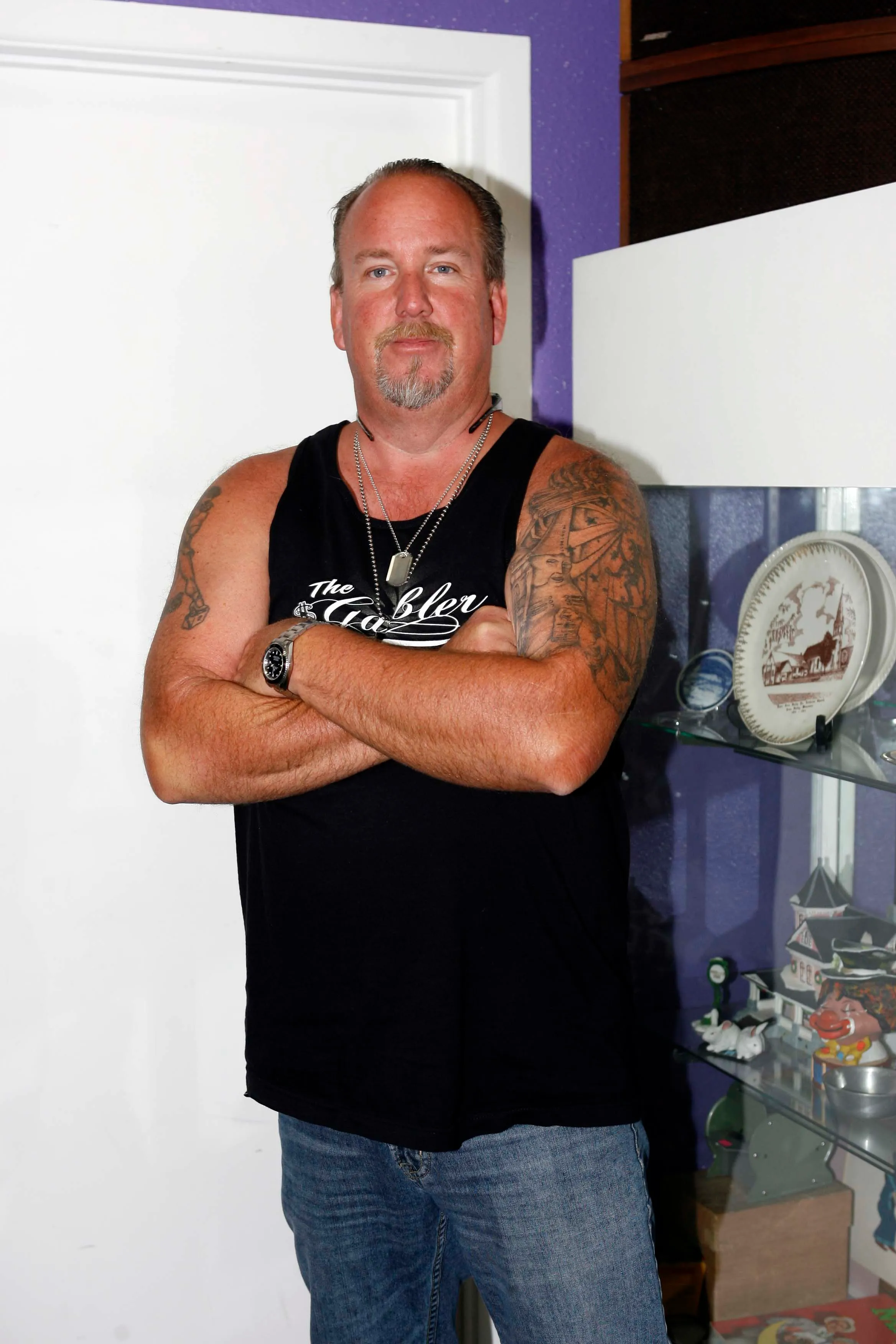 Jarrod Schulz with his arms crossed.