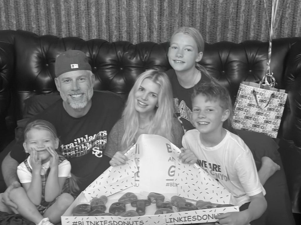 Jessica Simpson and Eric Johnson celebrate his birthday with their three children and a box of donuts.