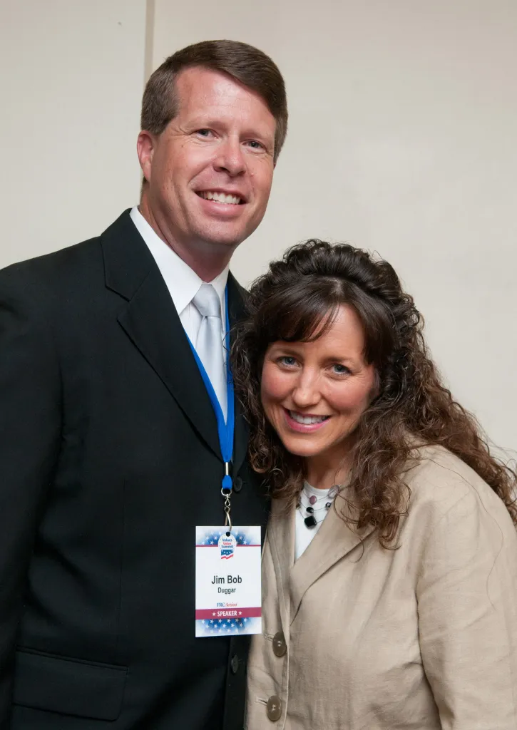 Jim Bob Duggar and Michelle Duggar posing for a photo.