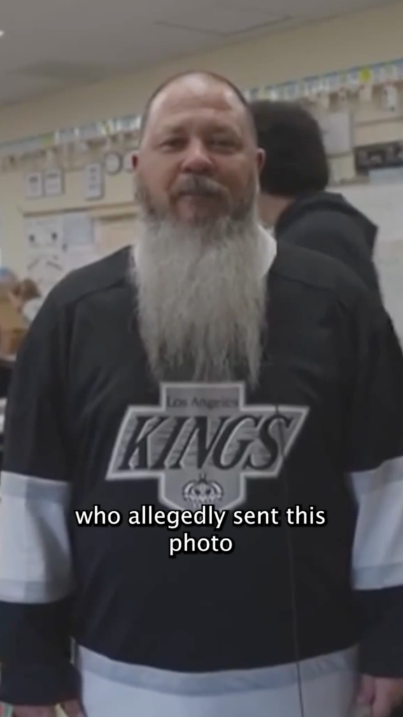 John Solomon, a man with a long white beard, wearing a black Los Angeles Kings jersey.