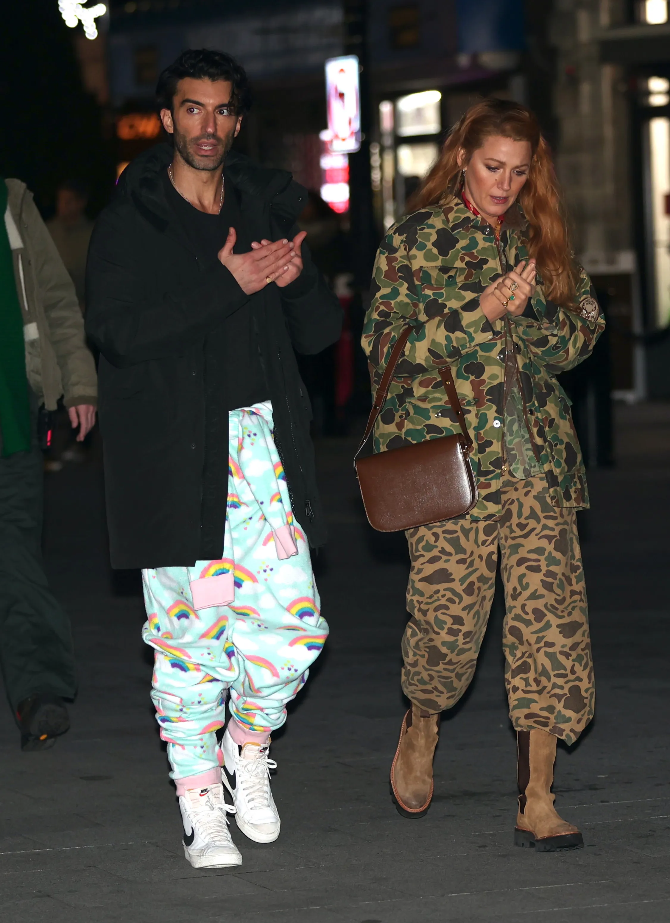 Justin Baldoni wearing rainbow pajamas and Blake Lively in camouflage on the set of 