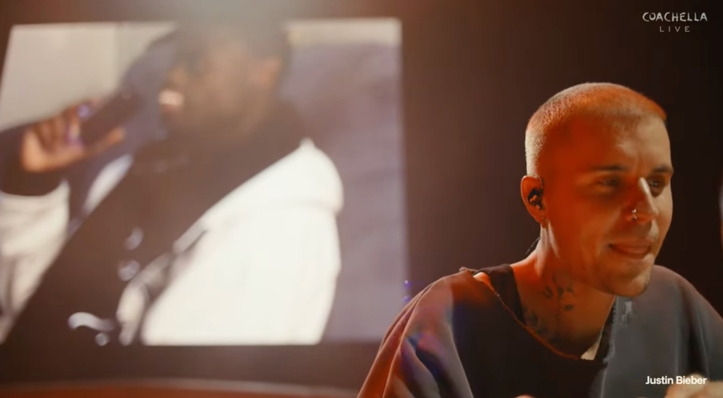 Justin Bieber performing on stage.