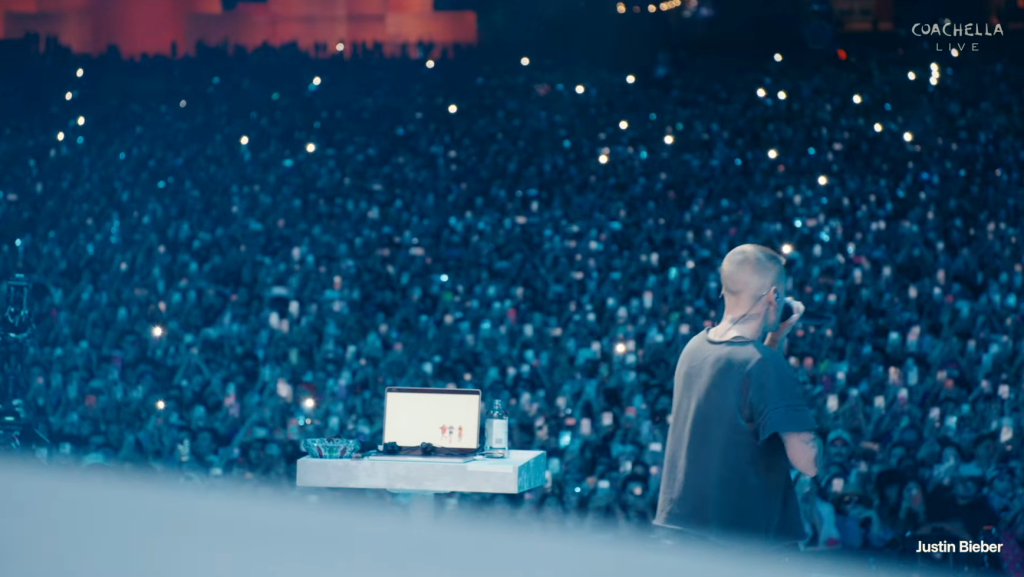 Justin Bieber performing for a crowd at Coachella.