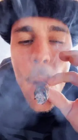 Justin Bieber smoking a blunt.