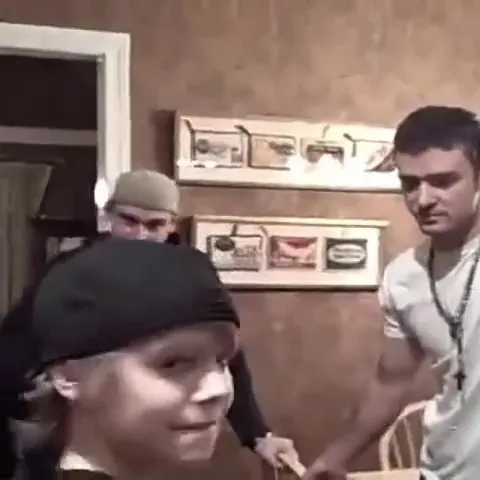 Justin Bieber, Justin Timberlake, and another man in a room.