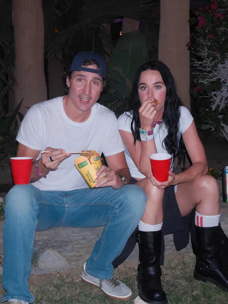 Justin Trudeau and Katy Perry eating snacks at the Coachella Valley Music and Arts Festival.