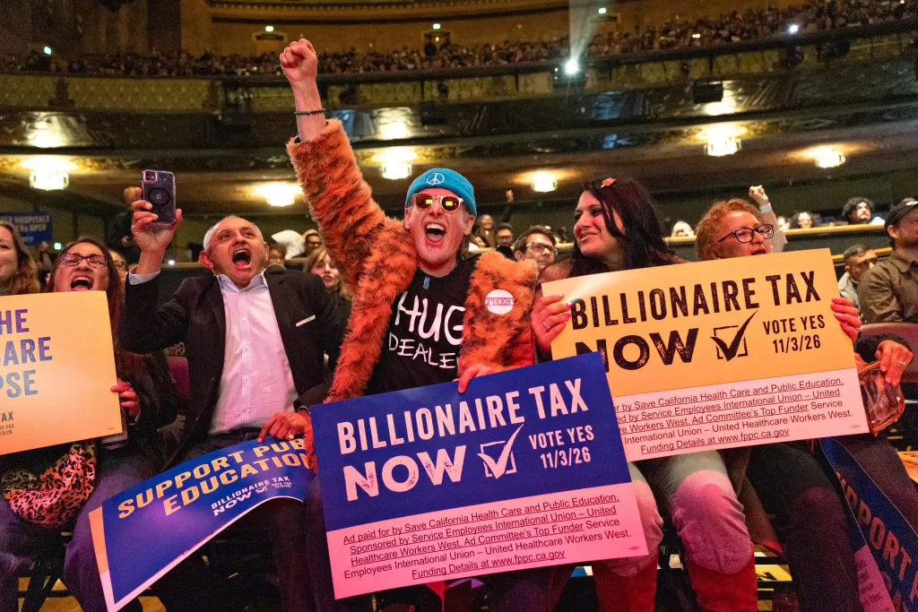 Keith Anthony Sakura and other supporters rally for the California Billionaire Tax Act in Los Angeles.