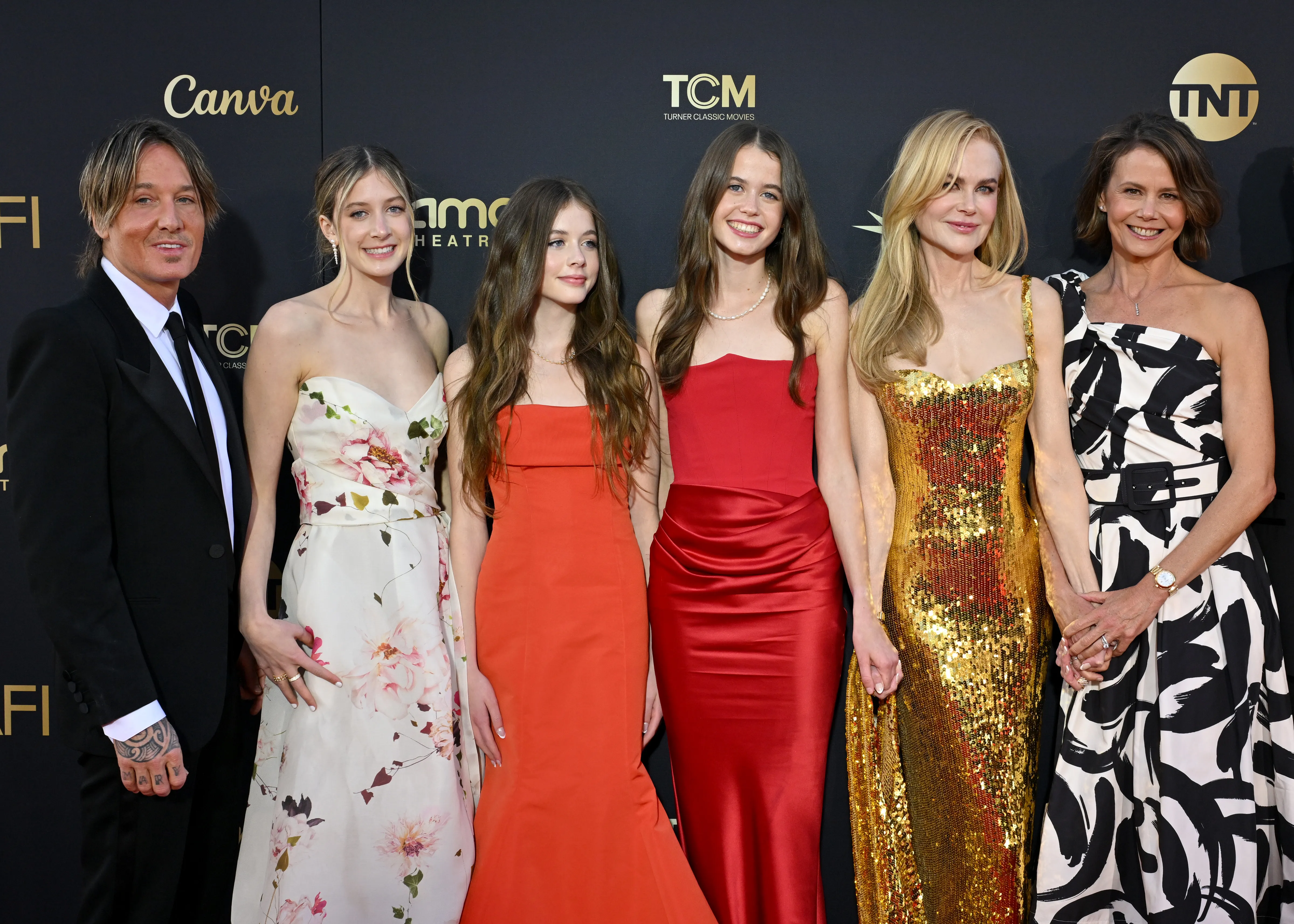 Keith Urban, Sunday Rose Kidman Urban, Faith Margaret Kidman Urban, Sybella Hawley, Nicole Kidman, and Antonia Kidman pose on the red carpet.