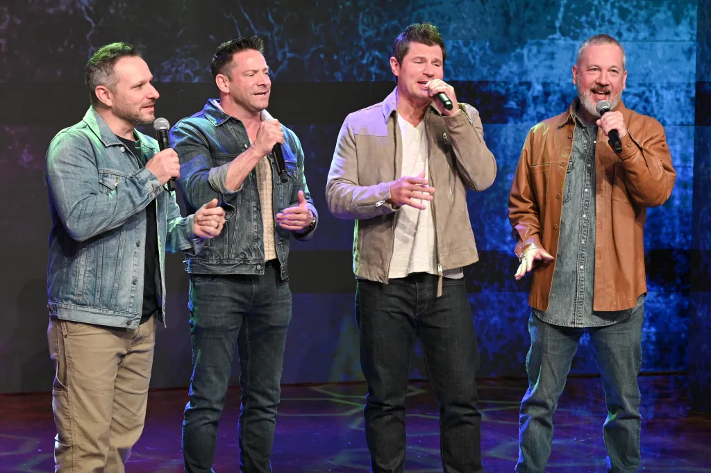 The boy band 98 Degrees performs on 