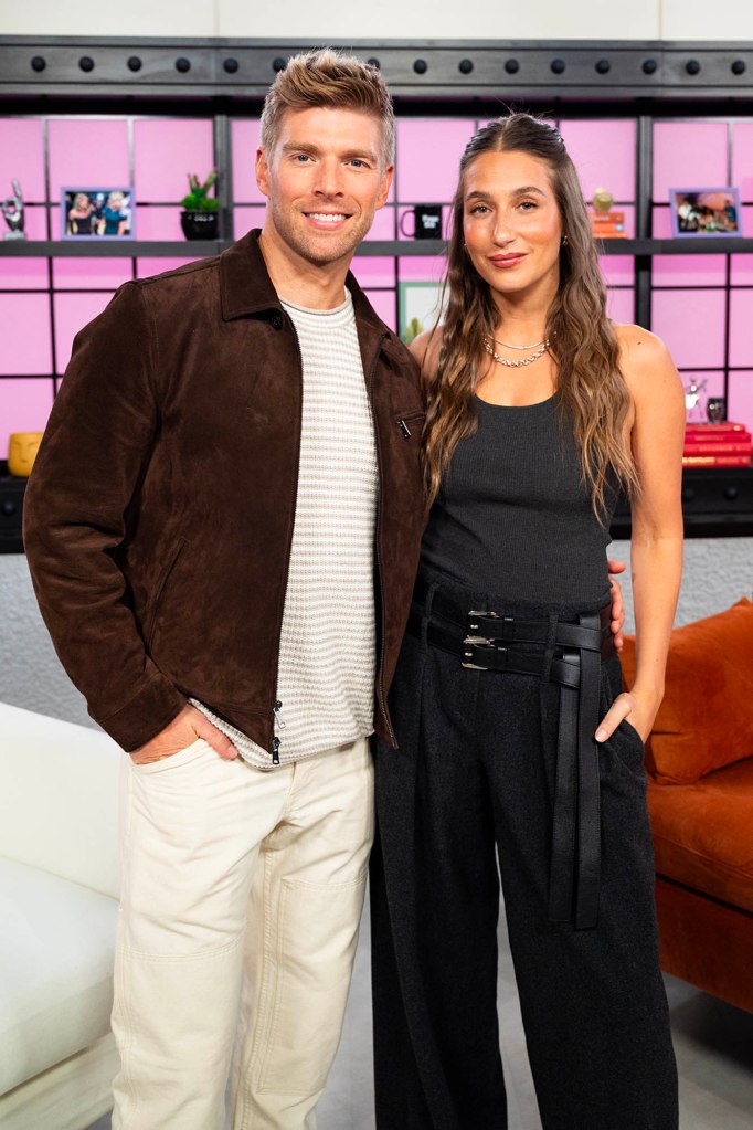 Kyle Cooke and Amanda Batula smiling at the camera.