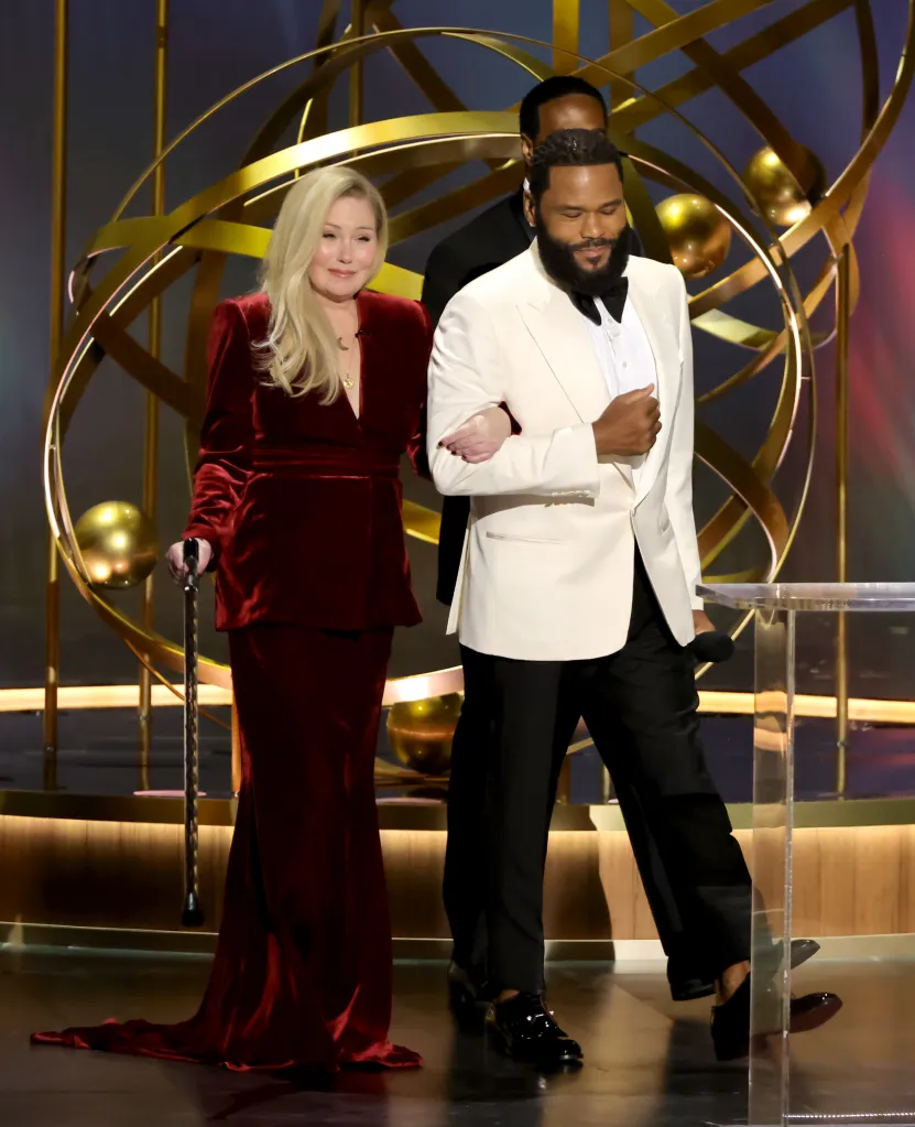 Christina Applegate and Anthony Anderson speaking onstage at the 75th Primetime Emmy Awards.