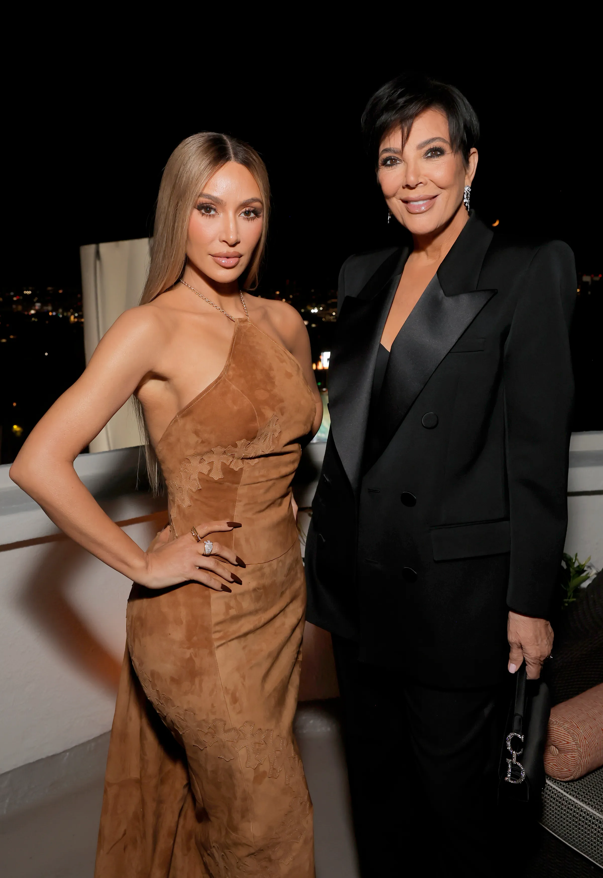 Kim Kardashian and Kris Jenner posing together at the GQ Men of the Year Party 2023.