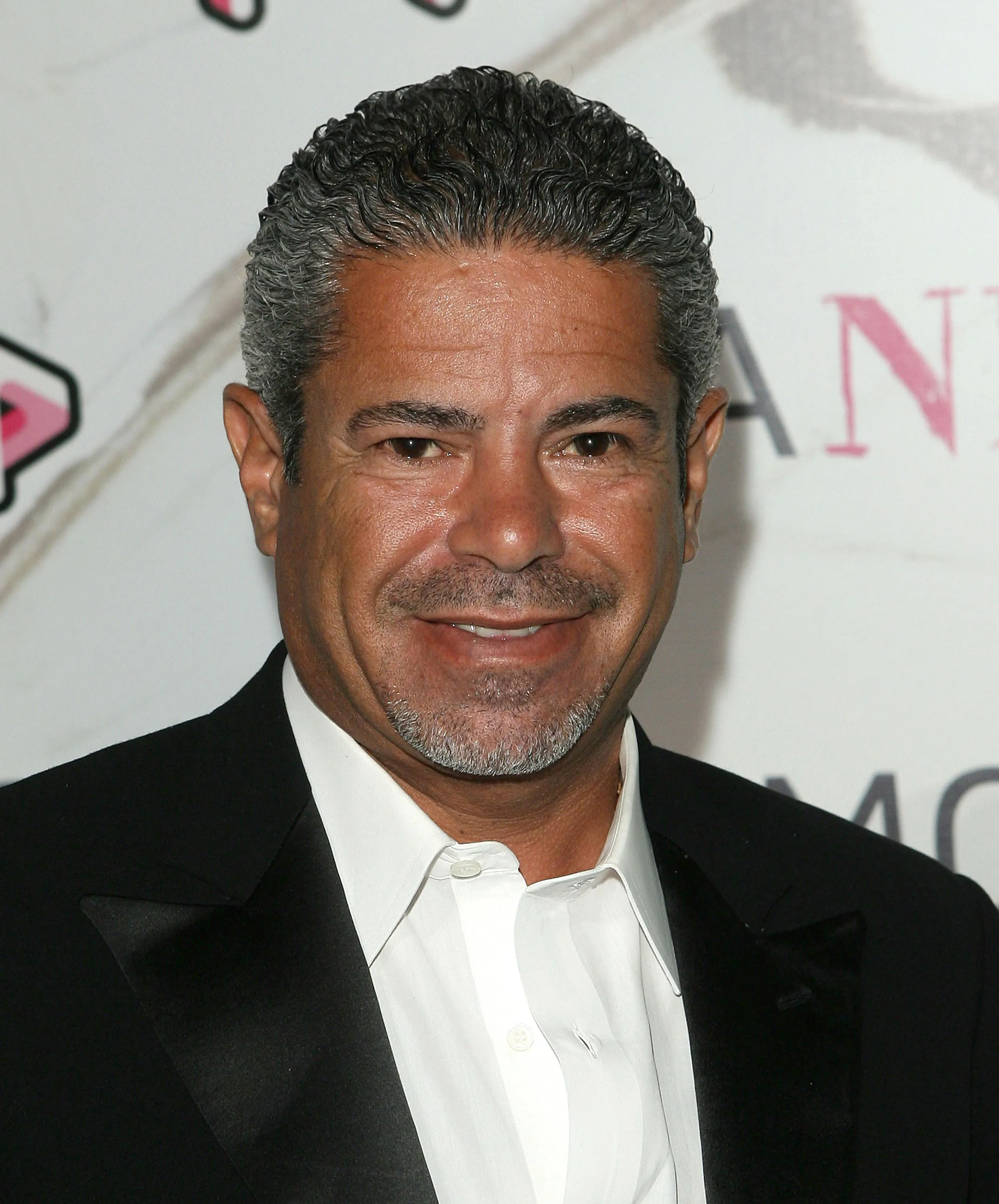 Lee Najjar smiling at MOCA's 30th anniversary after party.