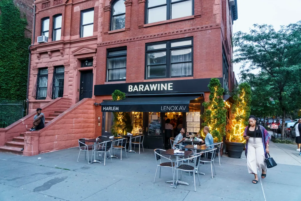 Barawine restaurant with outdoor dining on Lenox Avenue in Harlem, New York City.