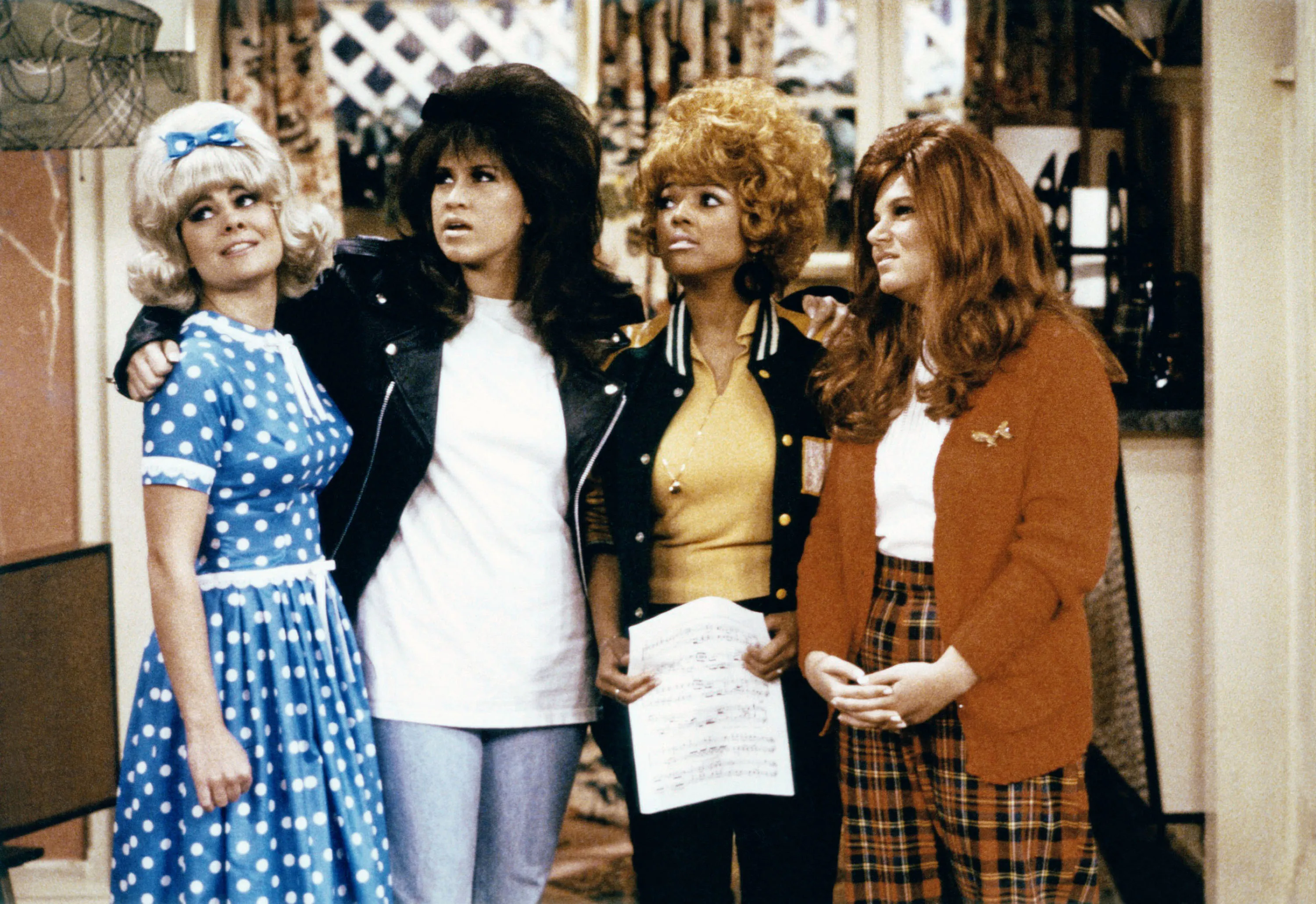 From left, Lisa Whelchel, Nancy McKeon, Kim Fields, and Mindy Cohn from The Facts of Life, wearing 1950s-inspired costumes.