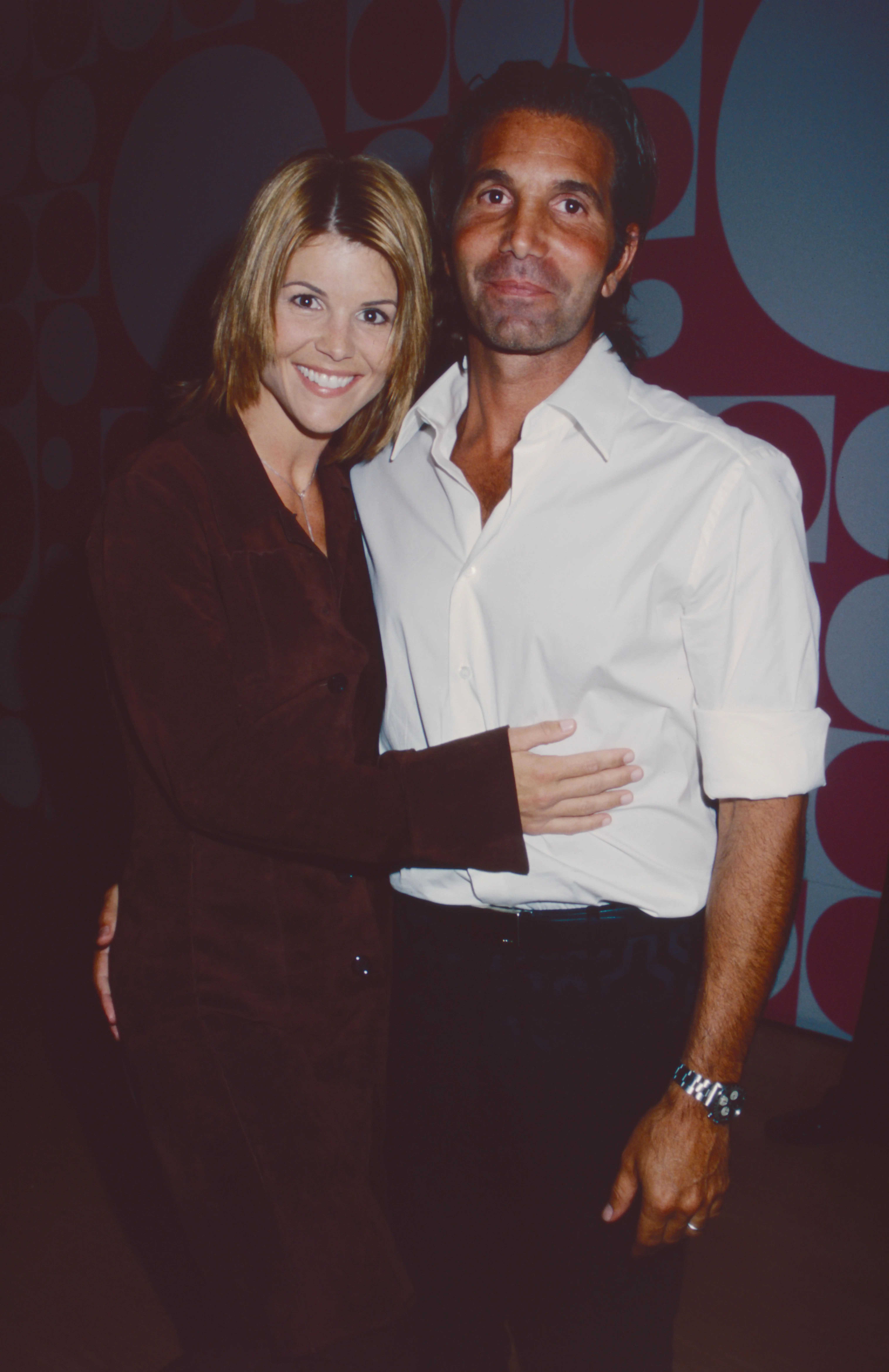 Lori Loughlin and Mossimo Giannulli attend a launch party for The Mossimo Collection at Target at Drive In Studio in New York City on November 9, 2000. 