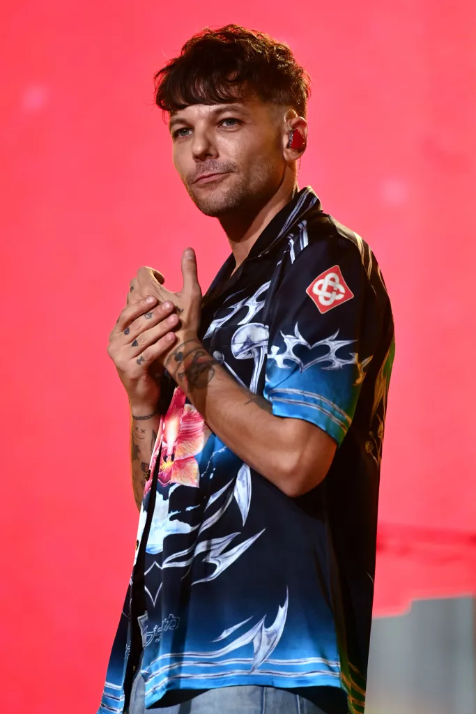 Louis Tomlinson performing on stage at Capital's Jingle Bell Ball.