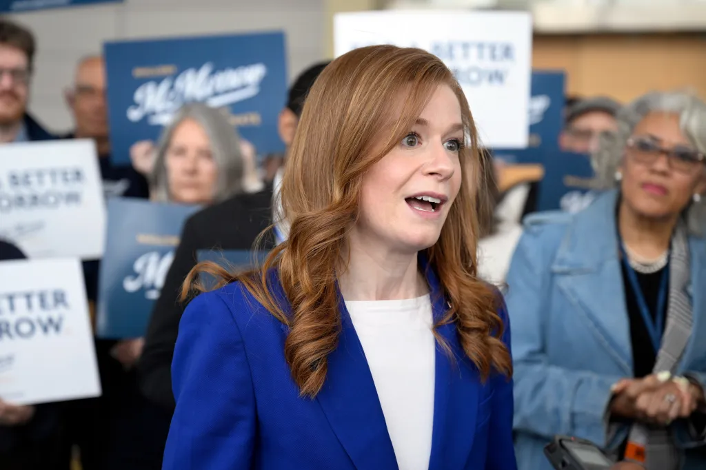 Mallory McMorrow speaking to the media at the Michigan Democratic Party State Endorsement Convention.
