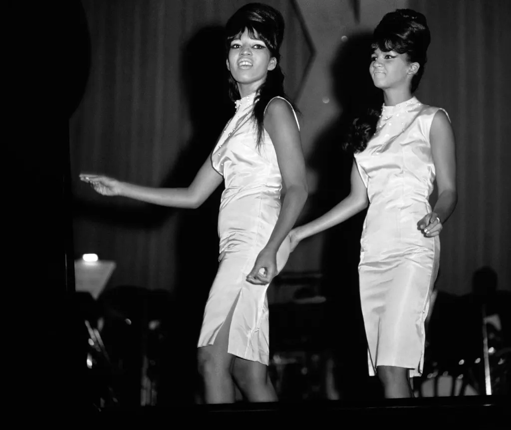 Estelle Bennett and Nedra Talley of The Ronettes performing on stage.