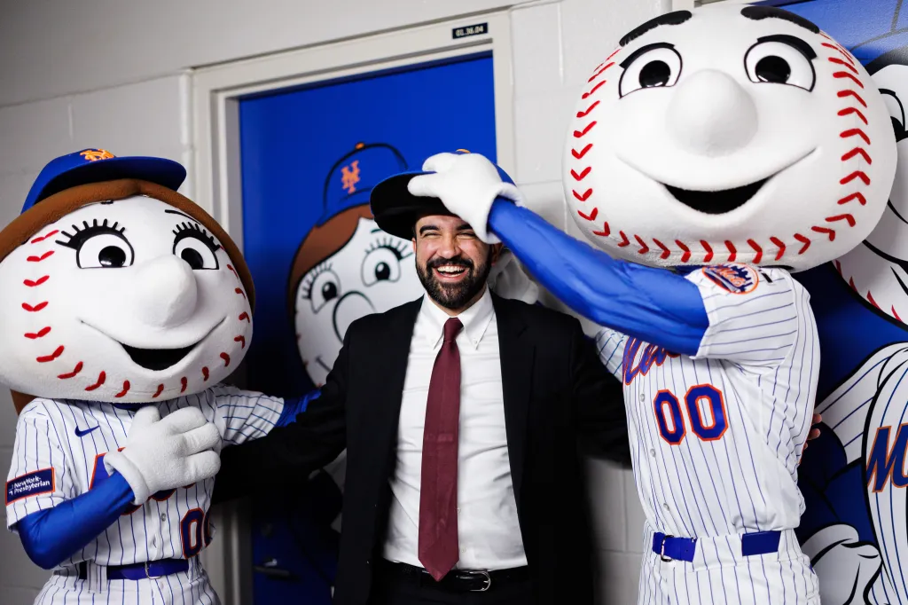 NEW YORK, NEW YORK - APRIL 09: New York City Mayor Zohran Mamdani meets Mrs. Met and Mr. Met at Citi Field prior to the game between the Arizona Diamondbacks and the New York Mets on April 09, 2026 in New York City. (Photo by Caean Couto/Getty Images)
