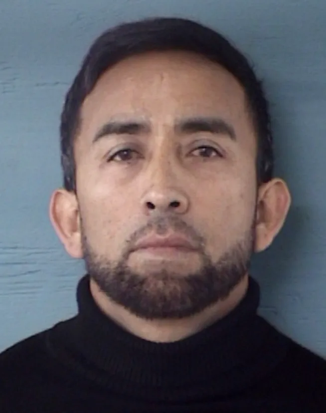Mugshot of Miguel Angel Saldana Garcia, accused of killing his ex-wife and her new boyfriend.