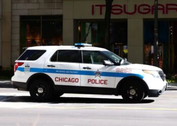 Two police officers shot during prisoner transport at Chicago hospital, suspect in custody