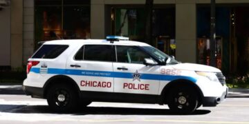 Two police officers shot during prisoner transport at Chicago hospital, suspect in custody