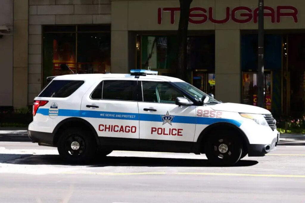Two police officers shot during prisoner transport at Chicago hospital, suspect in custody