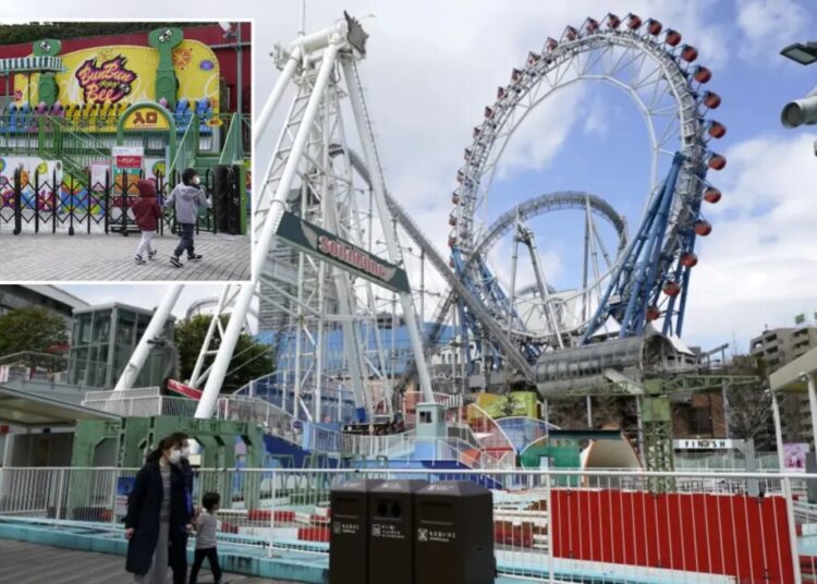 Tokyo theme park worker dies after being trapped inside ride mechanism during routine maintenance
