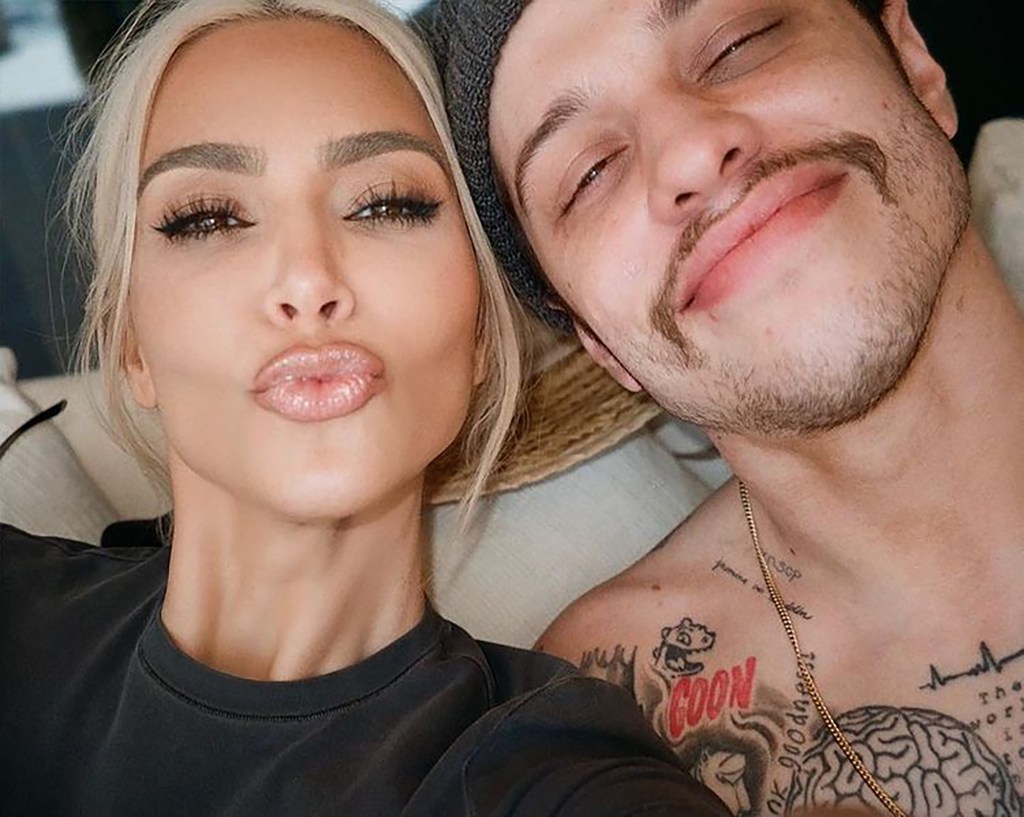 Kim Kardashian West and Pete Davidson posing for a selfie.