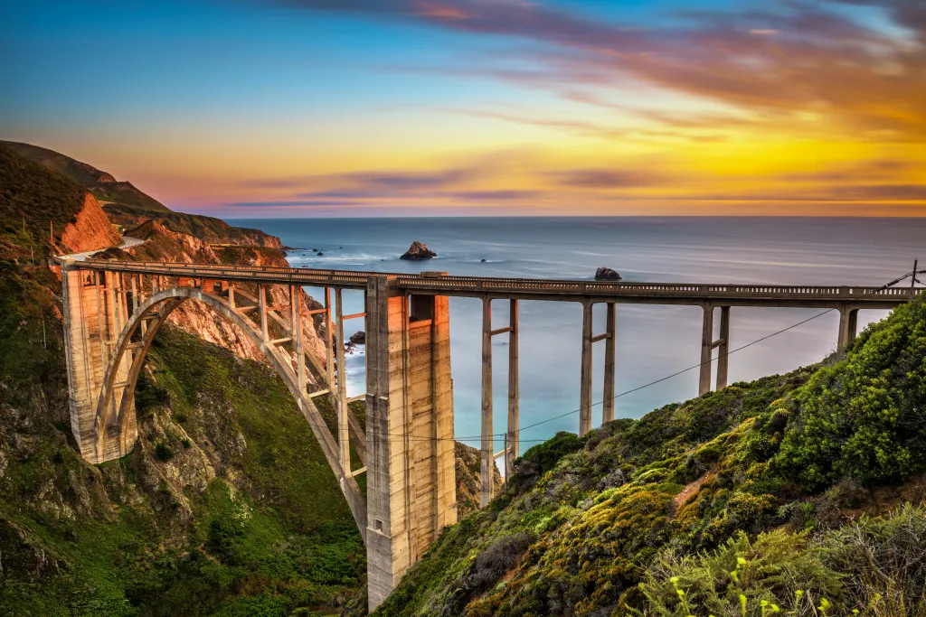 Bixby Bridge and Pacific Coast Highway at sunset.
