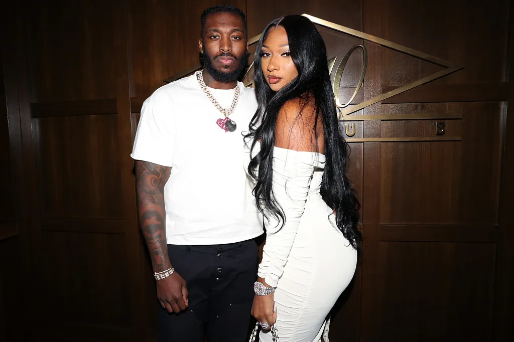 Pardison Fontaine and Megan Thee Stallion standing together, looking at the camera.