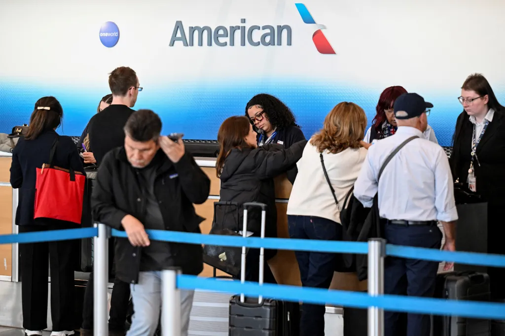 Passengers at the American Airlines terminal ticket counter at Chicago O'Hare International Airport.