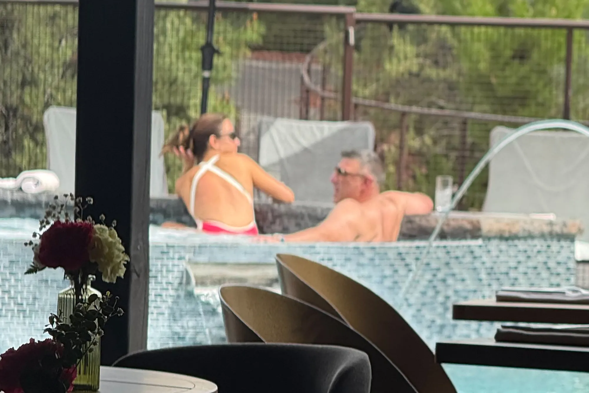 Mike Vrabel and Dianna Russini in a hot tub.