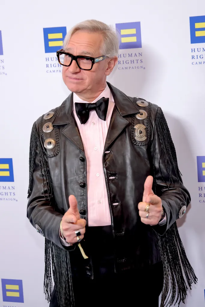 Paul Feig wearing a black fringed leather jacket, pink shirt, and black bow tie at the Human Rights Campaign Los Angeles Dinner.