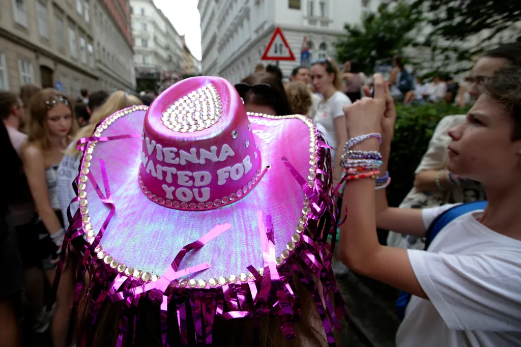 A person wears a purple head as fans of Taylor Swift also known as Swifties gather in the city centre in Vienna, Aug. 8, 2024.
