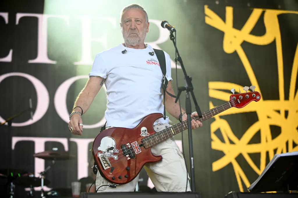 Peter Hook and The Light performing live on stage.