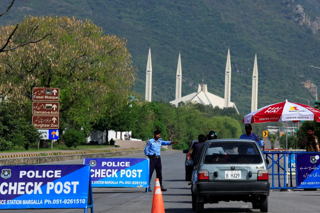 A vehicle goes through a police checkpoint in Islamabad, Pakistan, as the city prepares for round two of negotiations between the US and Iran on April 19, 2026.