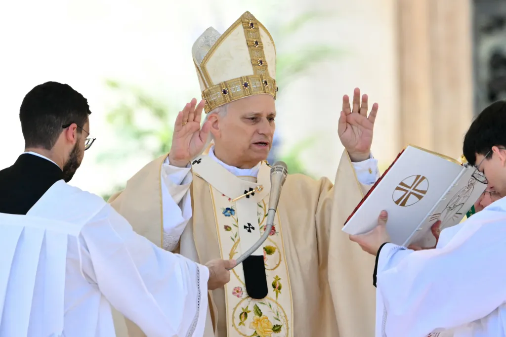 Pope Leo XIV offers a prayer during Easter Mass, as part of Holy Week celebrations, at the Vatican.