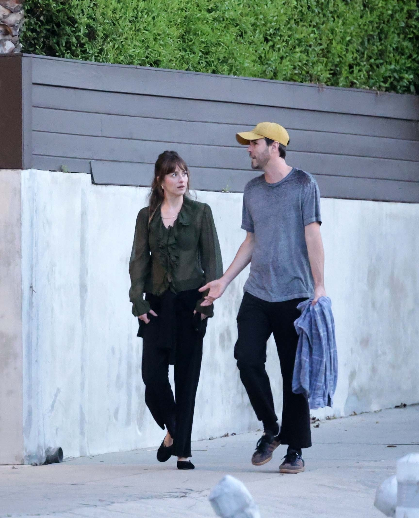 Dakota Johnson and Role Model walking together in Los Feliz.