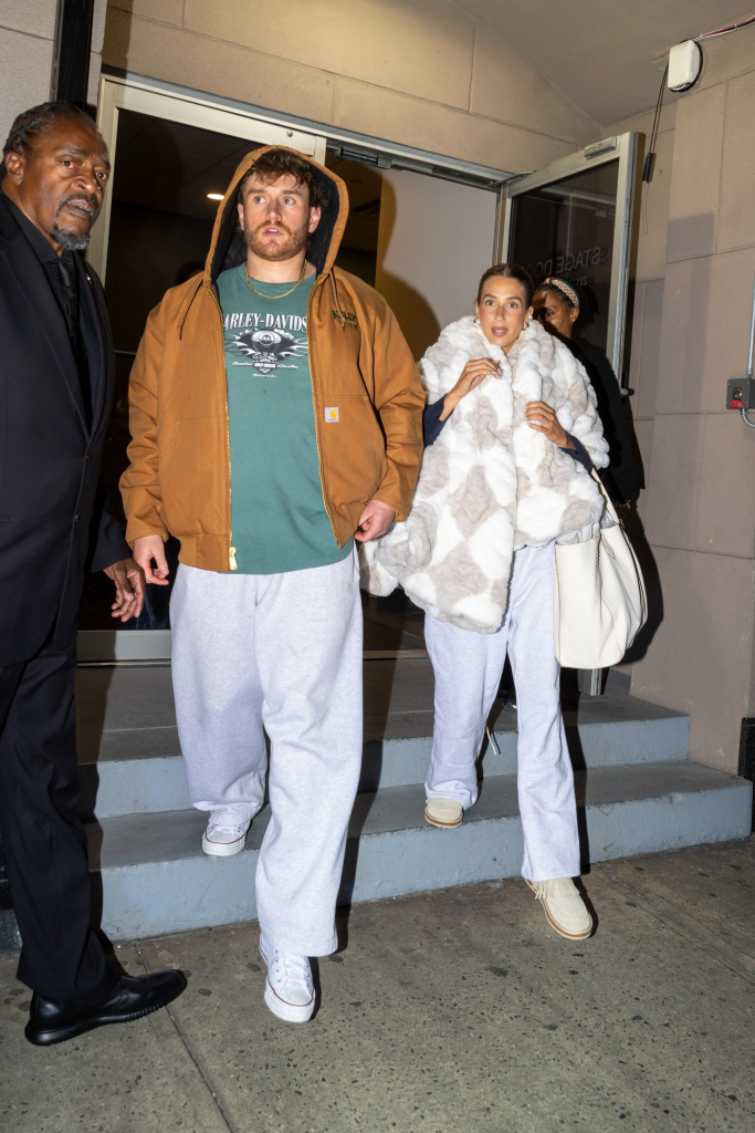 Amanda Batula and West Wilson in casual attire leaving a 