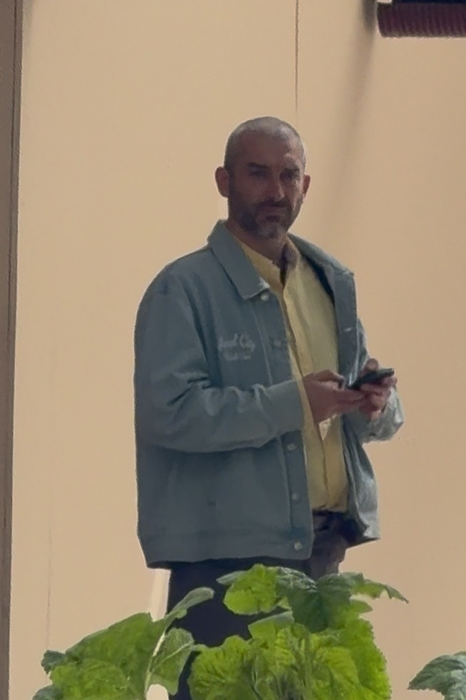 Tanguy Destable holding a phone.