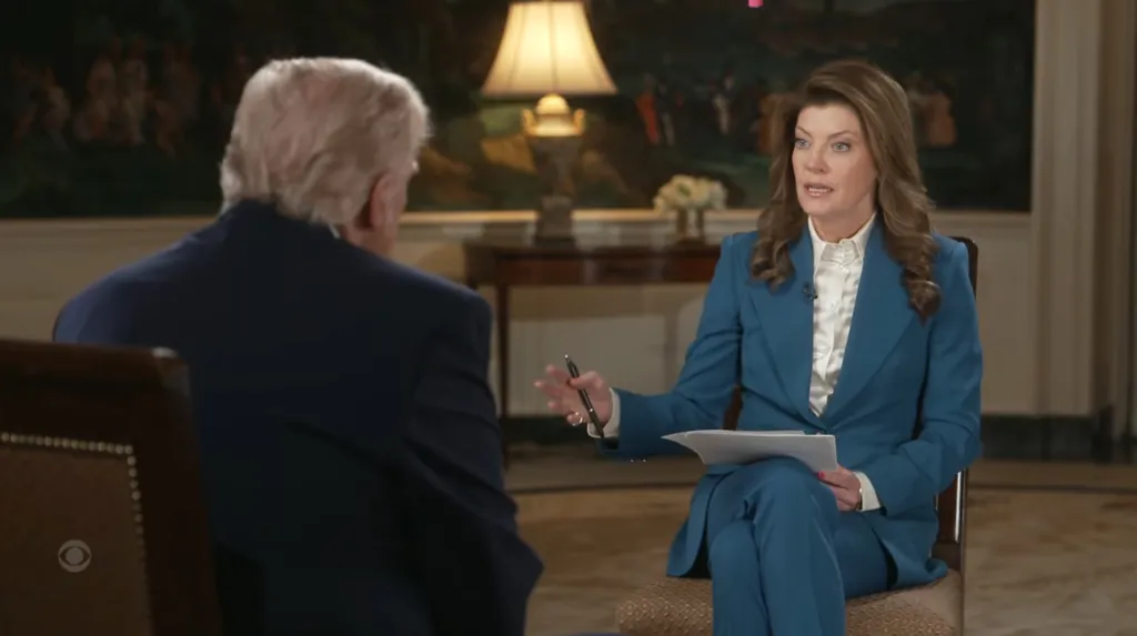 President Donald Trump being interviewed by a woman in a blue suit on CBS' 60 Minutes.
