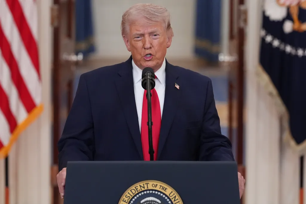 President Donald Trump speaking about the Iran war from the Cross Hall of the White House.