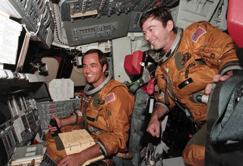 Astronauts John Young and Robert Crippen in the Columbia space shuttle flight deck.