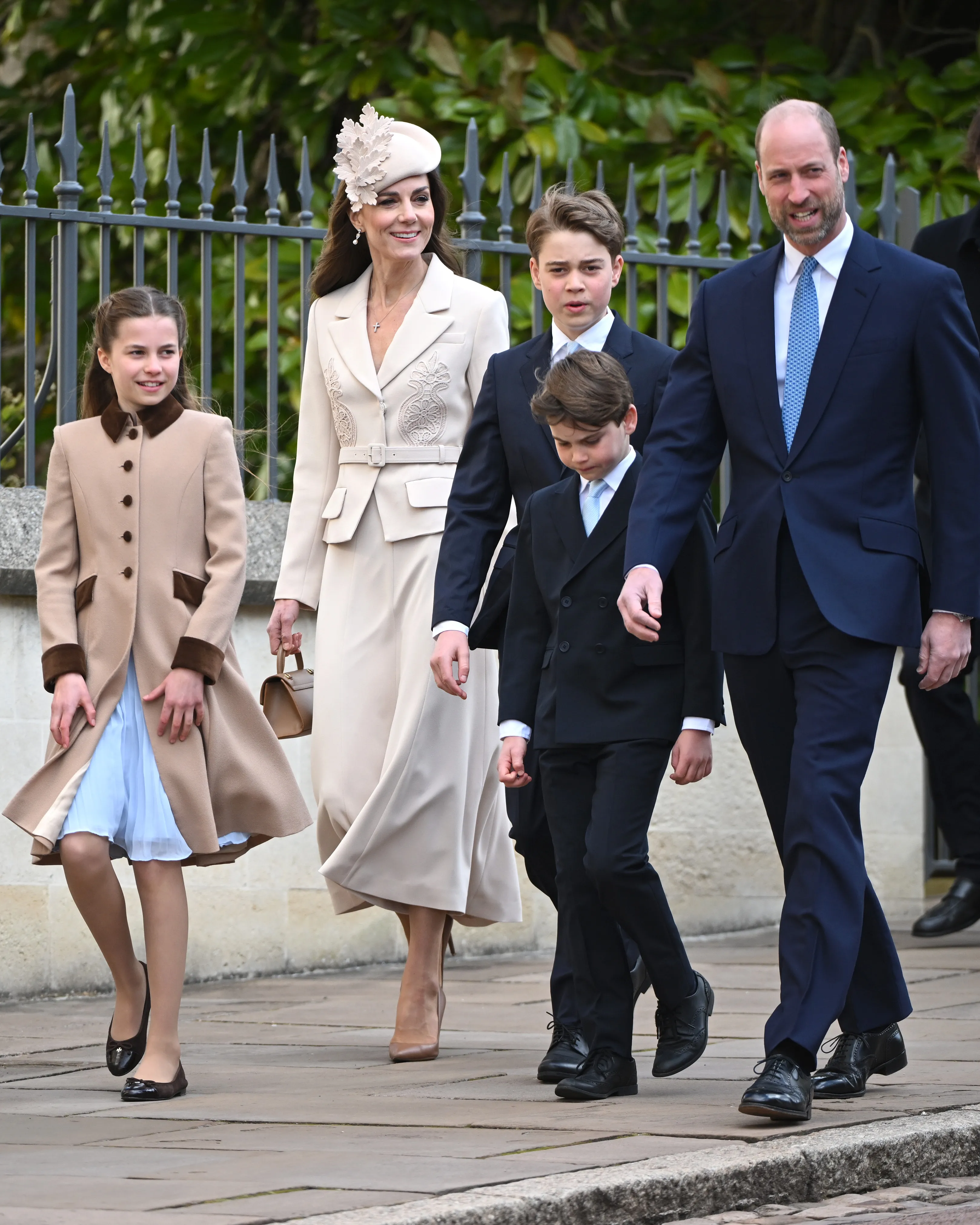 Princess Charlotte, Princess Catherine, Prince George, Prince Louis, and Prince William walking together at the 2026 Easter Matins Service.