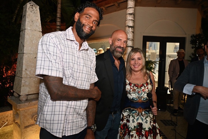Pro basketball player Gary Forbes and Navy Seal Veteran William Branum with Andrea Bartzen.